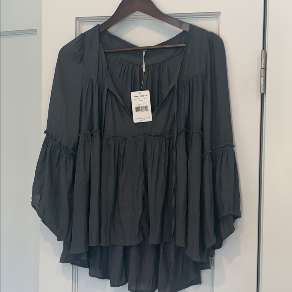 Free People peasant style top. Brand new with tag